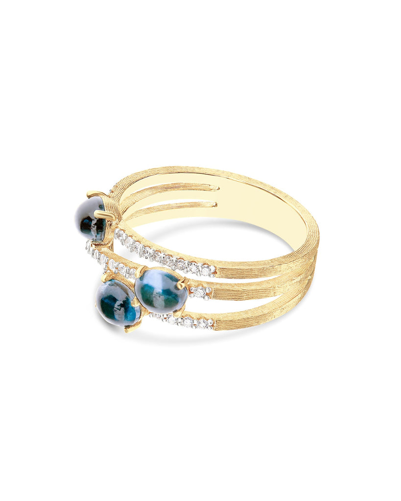 Anello "DANCING AZURE" a tripla fascia incrociata in oro, diamanti e topazio London blu