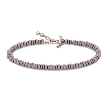 BRACCIALE UOMO CON ANELLINI IN TITANIO E ORO ROSSO 9 KT