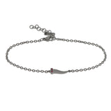 BRACCIALE CON CORNETTO MINI IN TITANIO E RUBINI