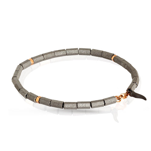 MANO J. BRACCIALE A CILINDRI PICCOLI IN TITANIO E 3 RONDELLE ORO ROSSO 9 KT